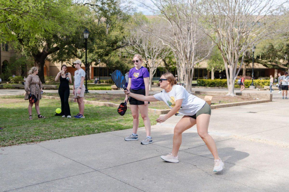 LSU accounting junior Catherine LeFevre hits the ball Thursday, March 7, 2024, in the Quad on LSU's campus in Baton Rouge, La.