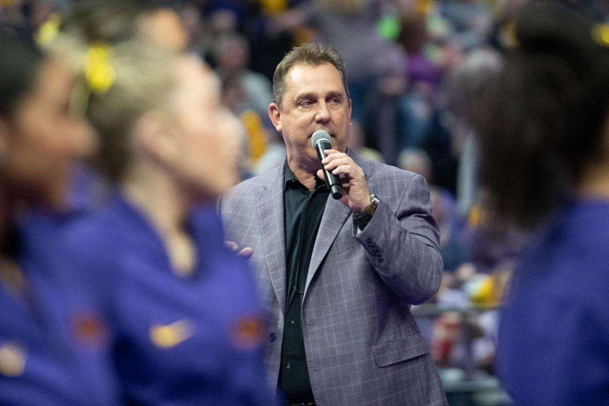 LSU gymnastics head coach Jay Clark speaks to the crowd Friday, March 15, 2024, before LSU's 198.250-196.075 win against North Carolina at the Pete Maravich Assembly Center in Baton Rouge, La.