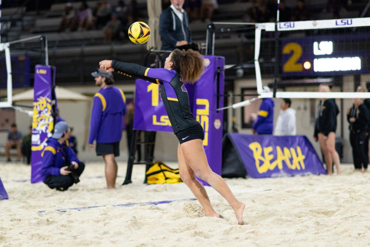 LSU beach volleyball freshman Yali Ashush (26) hits the ball back Saturday, March 2, 2024, during LSU's 5-0 win against Nebraska at the LSU Beach Volleyball Stadium in Baton Rouge, La.