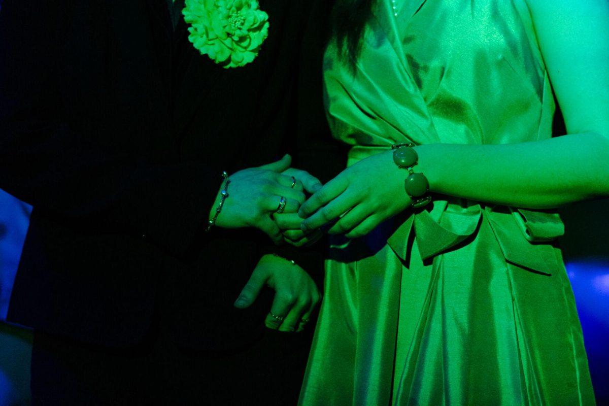 Jane Gatsby (Ava Russell) and Daisy Buchanan (Elyse Nave) hold hands in a production of Yearning Sunday, March 3, 2024, in Coates Hall on LSU's campus.