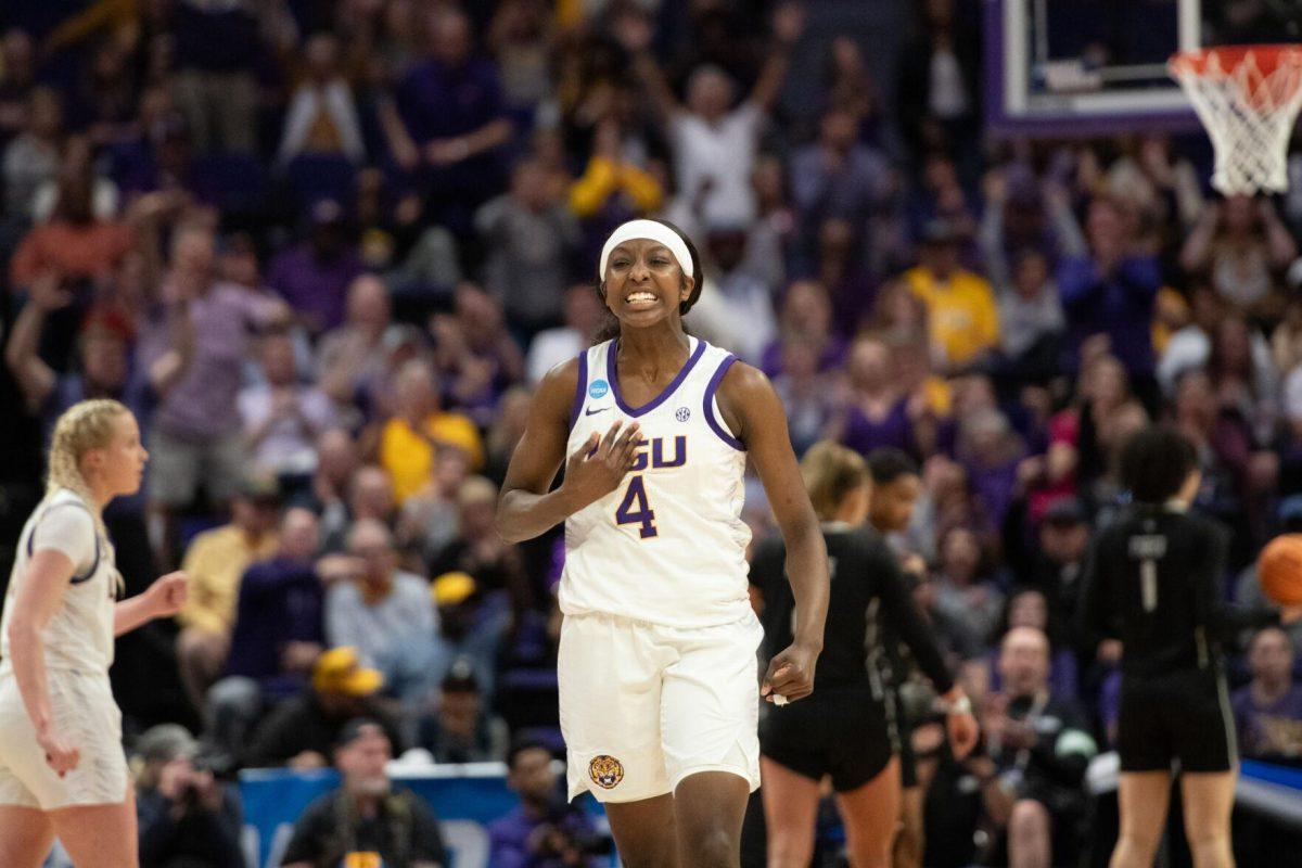 LSU women&#8217;s basketball sophomore guard Flau&#8217;jae Johnson (4) celebrates scoring Friday, March 22, 2024, during LSU&#8217;s 70-60 first-round NCAA March Madness tournament victory against Rice at the Pete Maravich Center in Baton Rouge, La.