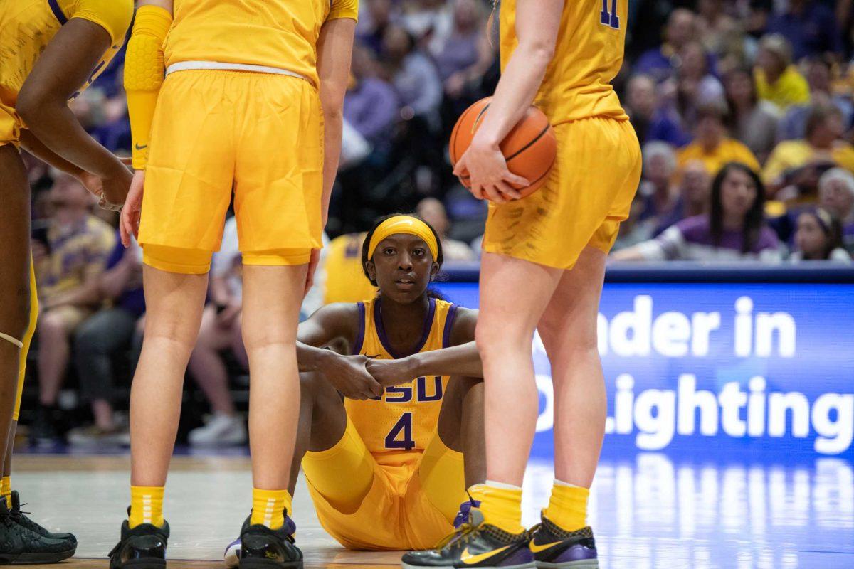 <p>LSU women’s basketball sophomore guard Flau’jae Johnson (4) sits on the court Sunday, March 3, 2024, during LSU’s 77-56 win against Kentucky at the Pete Maravich Assembly Center in Baton Rouge, La.</p>