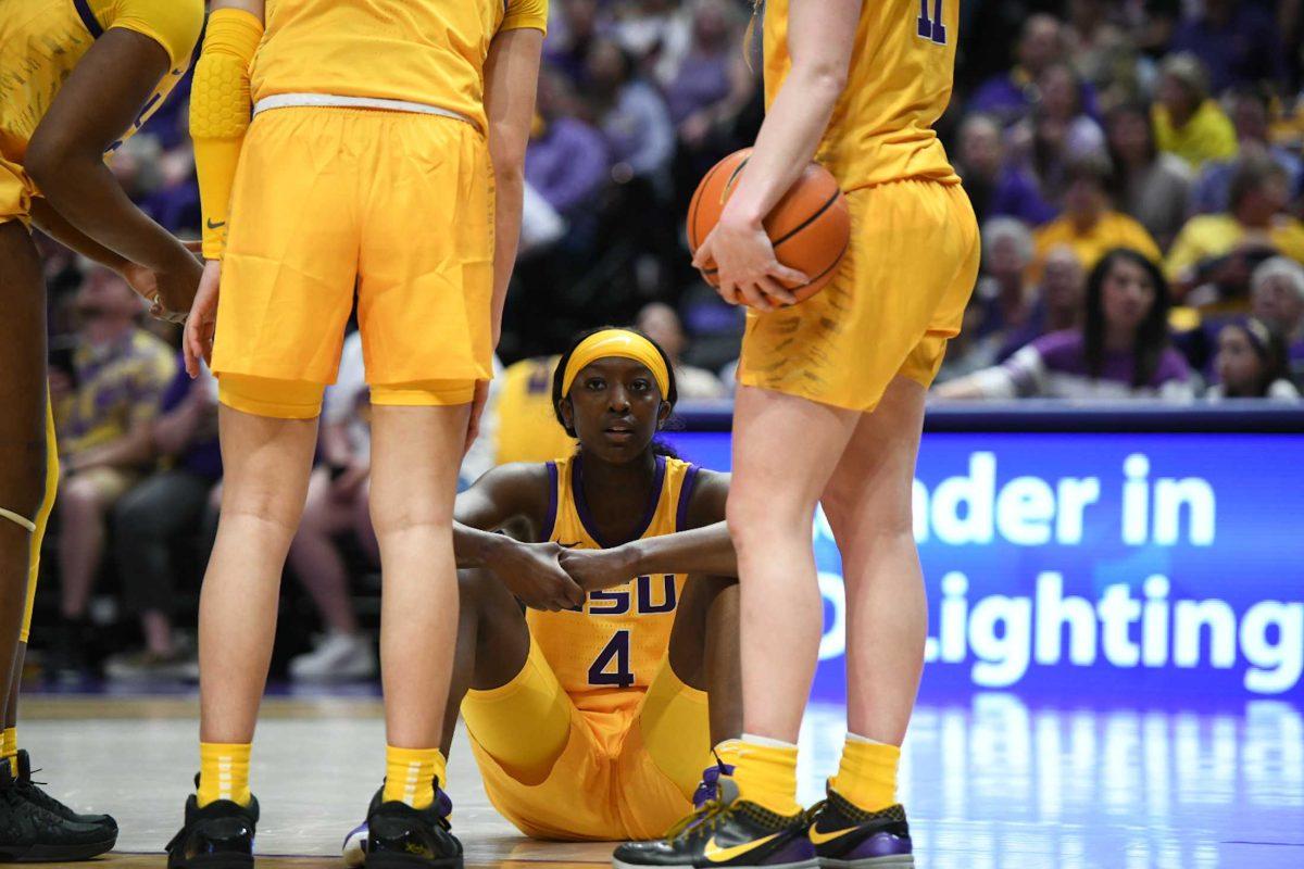 LSU women&#8217;s basketball sophomore guard Flau&#8217;jae Johnson (4) sits on the court Sunday, March 3, 2024, during LSU&#8217;s&#160;77-56 win against Kentucky at the Pete Maravich Assembly Center in Baton Rouge, La.