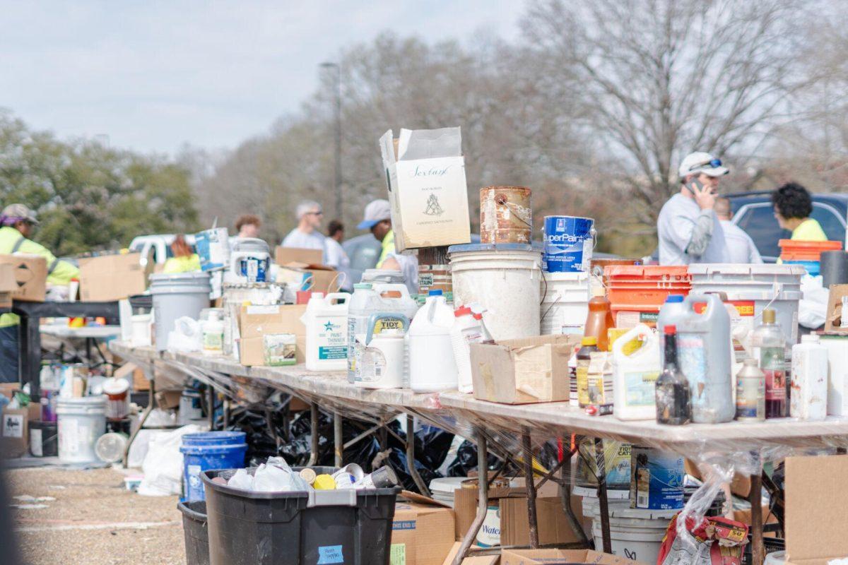 Items fill a number of tables Saturday, March 2, 2024, at the Household Hazardous Materials Collection Day on LSU's campus in Baton Rouge, La.