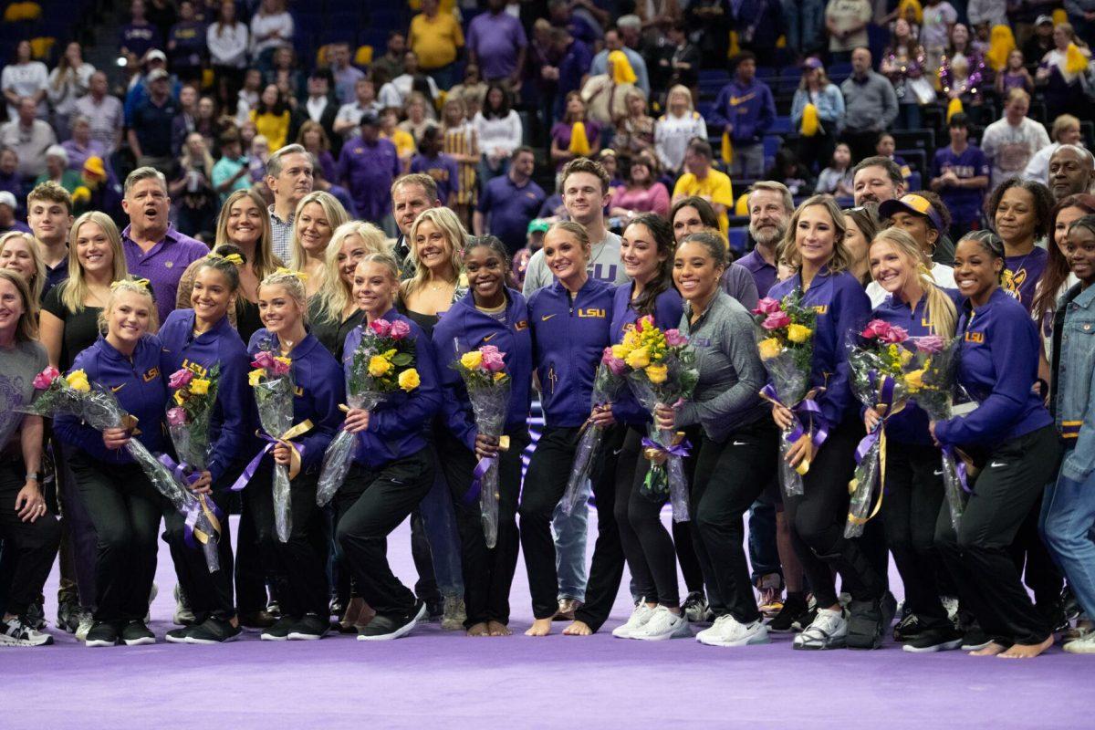 LSU gymnastics seniors pose Friday, March 15, 2024, after LSU's 198.250-196.075 win against North Carolina at the Pete Maravich Assembly Center in Baton Rouge, La.