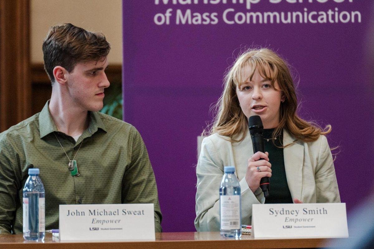 Sydney Smith answers a question as John Michael Sweat listens Monday, March 18, 2024, inside the Holliday Forum at LSU in Baton Rouge, La.