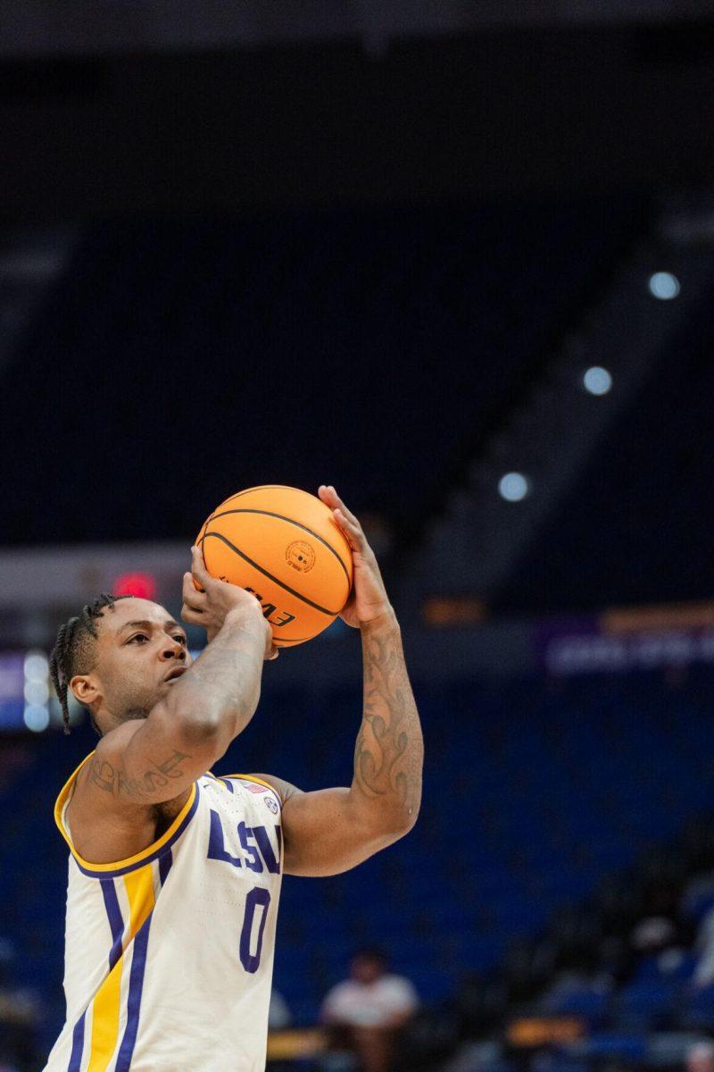 LSU men&#8217;s basketball 5th-year senior guard Trae Hannibal (0) shoots a free throw Tuesday, March 19, 2024, during LSU&#8217;s 84-77 loss to the University of North Texas at the PMAC in Baton Rouge, La.