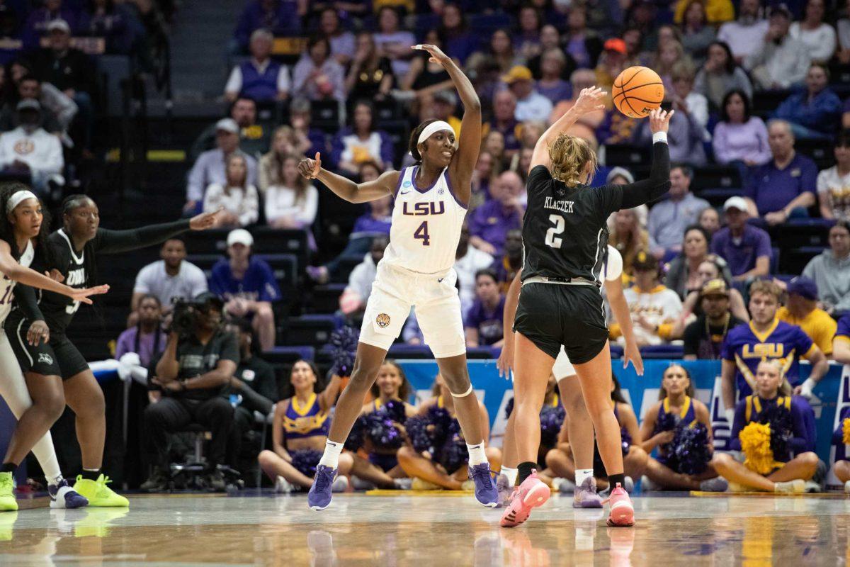 LSU women&#8217;s basketball sophomore guard Flau&#8217;jae Johnson (4) attempts to block her opponent Friday, March 22, 2024, during LSU&#8217;s 70-60 first-round NCAA March Madness tournament victory against Rice at the Pete Maravich Center in Baton Rouge, La.