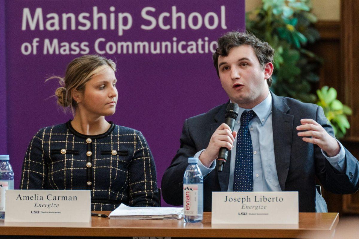 Joseph Liberto answers a question as Amelia Carman listens Monday, March 18, 2024, inside the Holliday Forum at LSU in Baton Rouge, La.