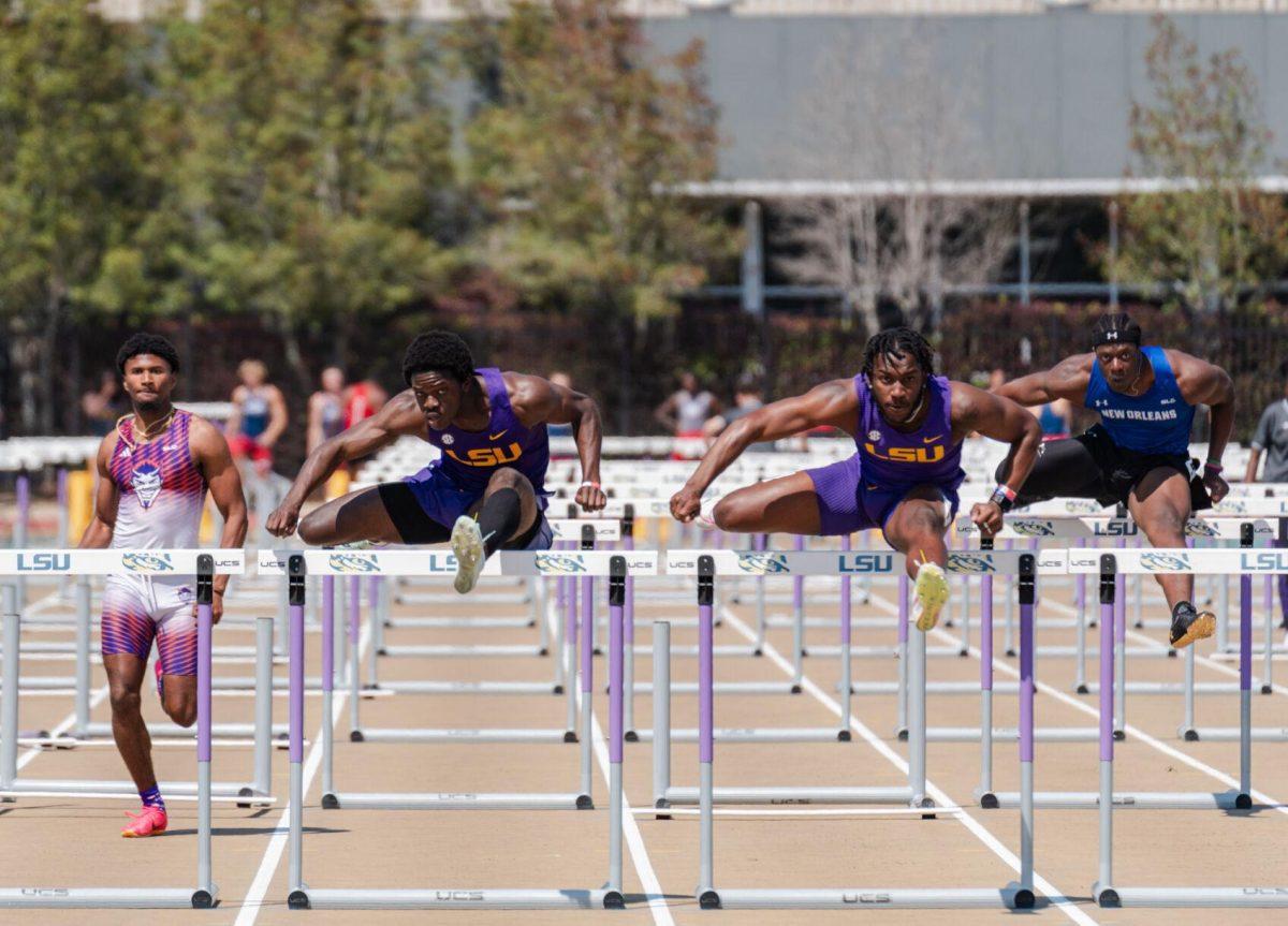 LSU track and field sprints sophomores Matthew Sophia (center left) and Jahiem Stern (center right) clear the final hurdle Saturday, March 23, 2024, during the Keyth Talley Invitational at the Bernie Moore Track Stadium in Baton Rouge, La.