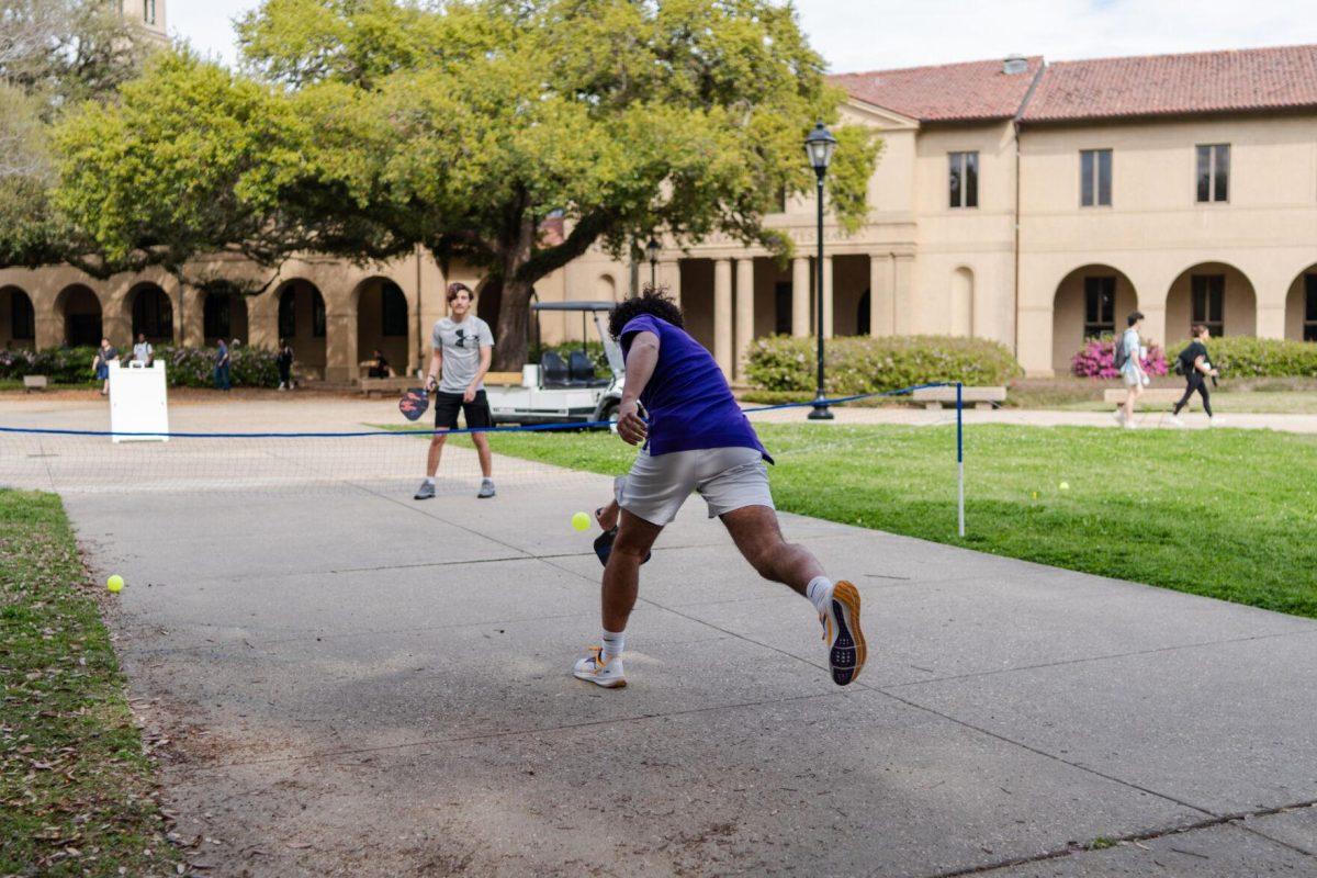 LSU public relations sophomore Gianpaolo Nicolosi returns the ball Thursday, March 7, 2024, in the Quad on LSU's campus in Baton Rouge, La.