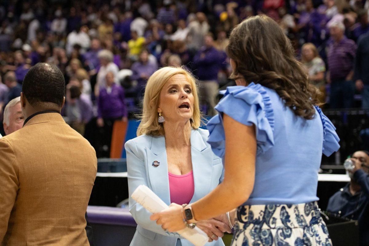 LSU women&#8217;s basketball head coach Kim Mulkey shakes hands with Rice's head coach Lindsay Edmonds Friday, March 22, 2024, after LSU&#8217;s 70-60 first-round NCAA March Madness tournament victory against Rice at the Pete Maravich Center in Baton Rouge, La.