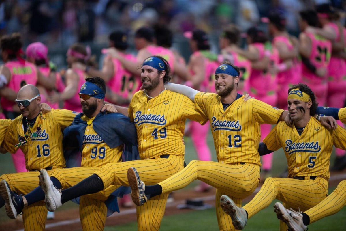 The Savannah Bananas kickline dance Thursday, March 14, 2024, during the Savannah Bananas 5-4 loss to the Party Animals during their world tour stop at Alex Box Stadium in Baton Rouge, La.