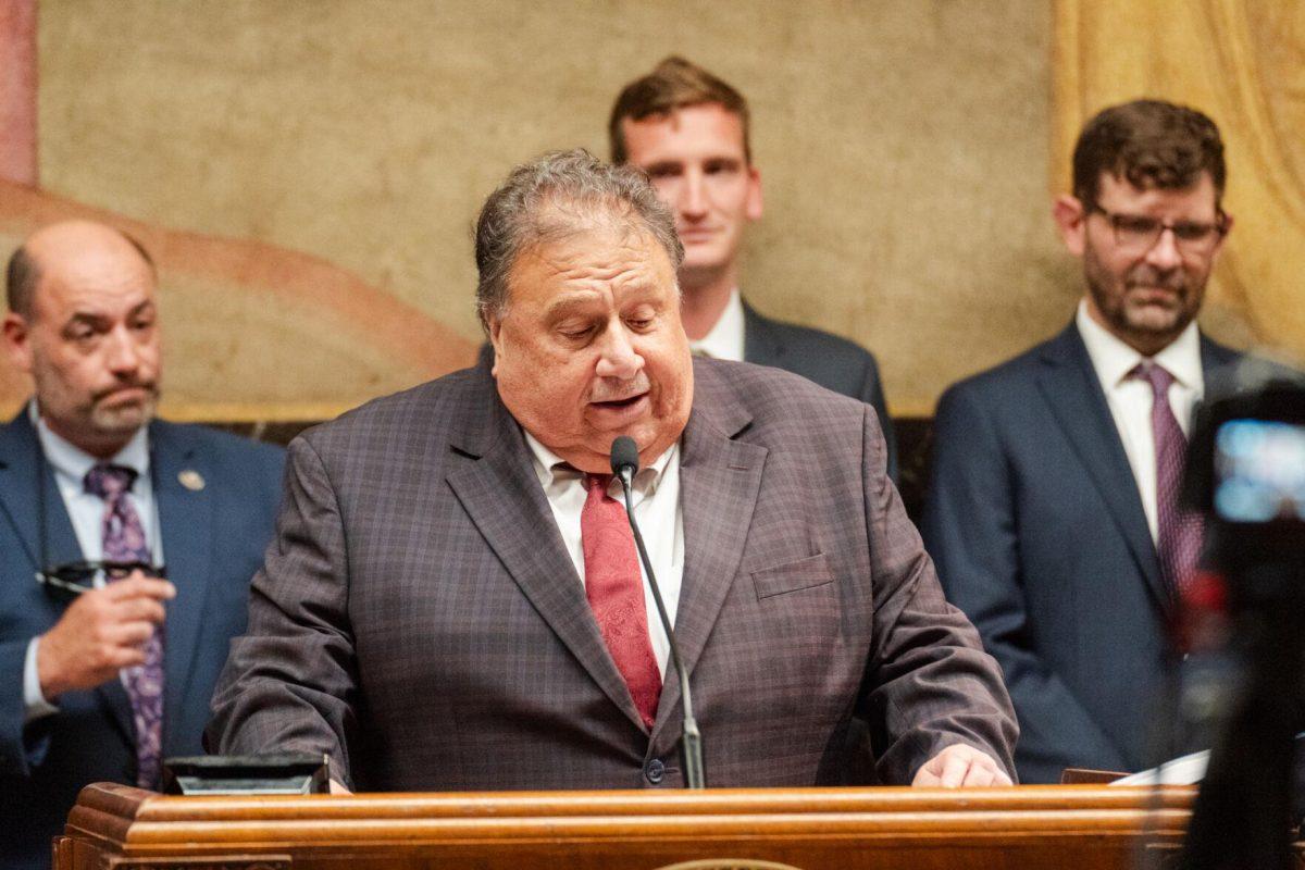 Louisiana Coastal Protection and Restortation Authority Chairman Gordon Dove speaks at the podium Monday, March 25, 2024, during Coastal Day 2024 at the State Capitol in Baton Rouge, La.