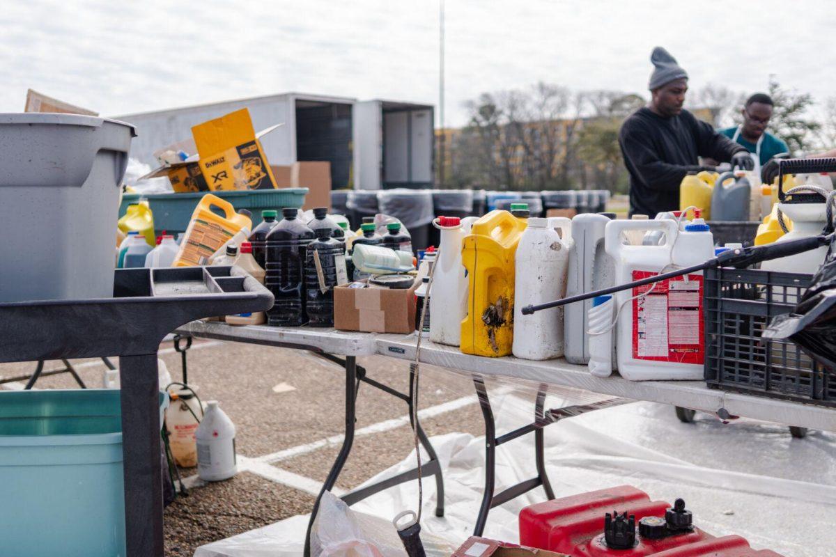 Various cartons sit on a table Saturday, March 2, 2024, at the Household Hazardous Materials Collection Day on LSU's campus in Baton Rouge, La.