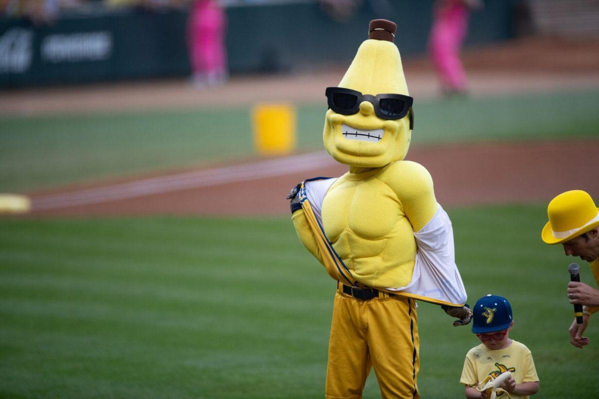 Savannah Bananas mascot Split removes his shirt Thursday, March 14, 2024, before the Savannah Bananas 5-4 loss to the Party Animals during their world tour stop at Alex Box Stadium in Baton Rouge, La.