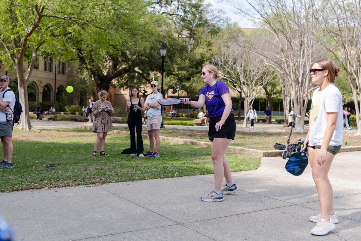 LSU public relations junior Morgan English hits the ball Thursday, March 7, 2024, in the Quad on LSU's campus in Baton Rouge, La.