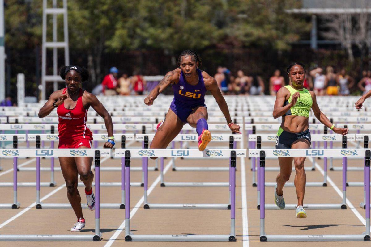 LSU track and field sprints senior Shani'a Bellamy clears the final hurdle Saturday, March 23, 2024, during the Keyth Talley Invitational at the Bernie Moore Track Stadium in Baton Rouge, La.