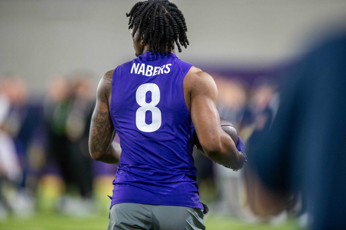 <p>LSU football wide receiver Malik Nabers (8) runs the ball back after catching it during LSU Pro Day on Wednesday, March 27, 2024, in Baton Rouge, La.</p>