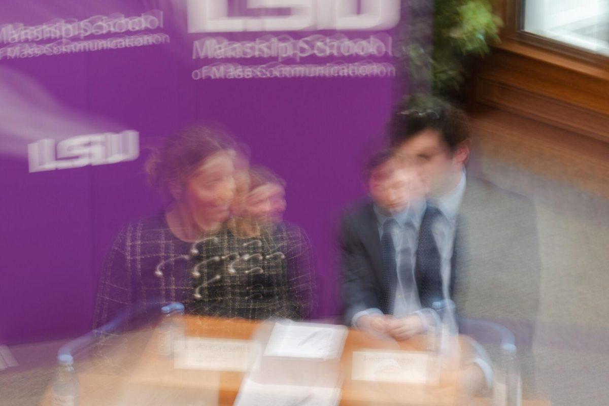 Amelia Carman and Joseph Liberto listen to the other campaign's points Monday, March 18, 2024, inside the Holliday Forum at LSU in Baton Rouge, La.