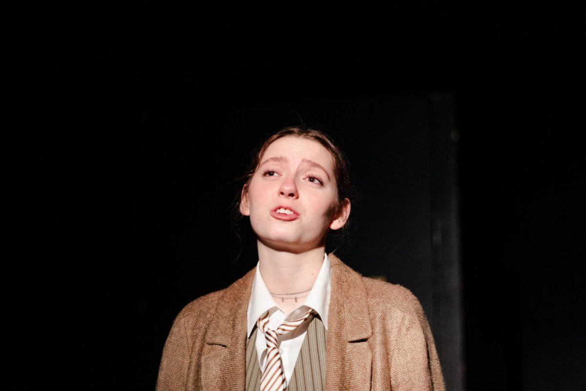 Younger Nick Carraway (Emily Pounds) speaks in a production of Yearning Sunday, March 3, 2024, in Coates Hall on LSU's campus.