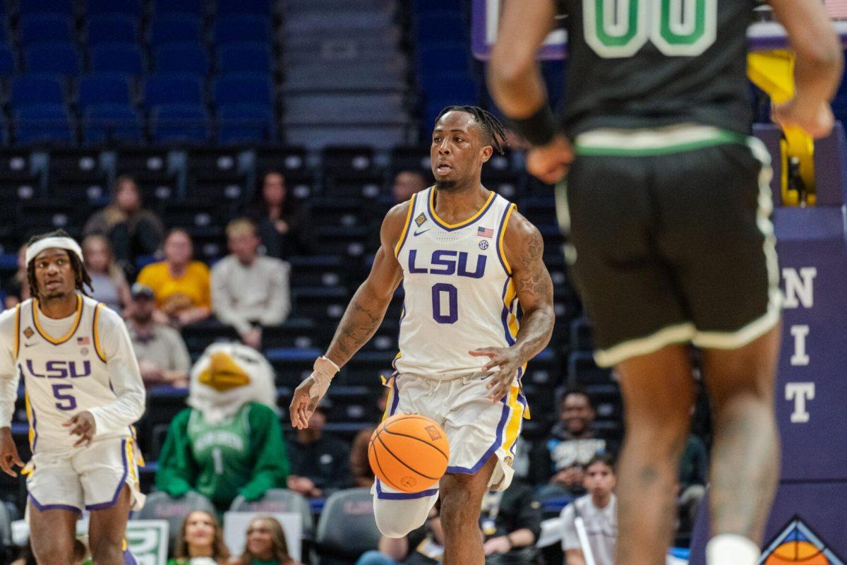 LSU men&#8217;s basketball 5th-year senior guard Trae Hannibal (0) dribbles down the court Tuesday, March 19, 2024, during LSU&#8217;s 84-77 loss to the University of North Texas at the PMAC in Baton Rouge, La.