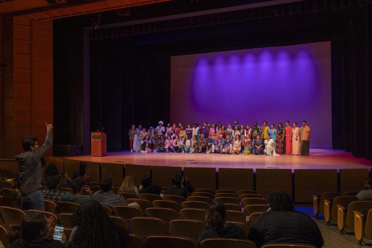 Performers of the International Fusion night pose for a photo Wednesday, March 20, 2024, following the last performance in the Union Theater on LSU's campus..