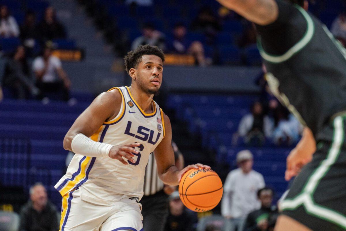 LSU men&#8217;s basketball graduate student guard Jordan Wright (6) dribbles the ball Tuesday, March 19, 2024, during LSU&#8217;s 84-77 loss to the University of North Texas at the PMAC in Baton Rouge, La.