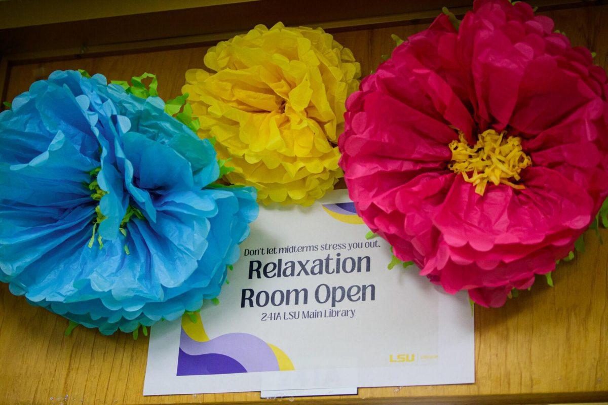 Paper flowers surround the sign on Thursday, March 7, 2024, in the relaxation room in the LSU Library in Baton Rouge, La.