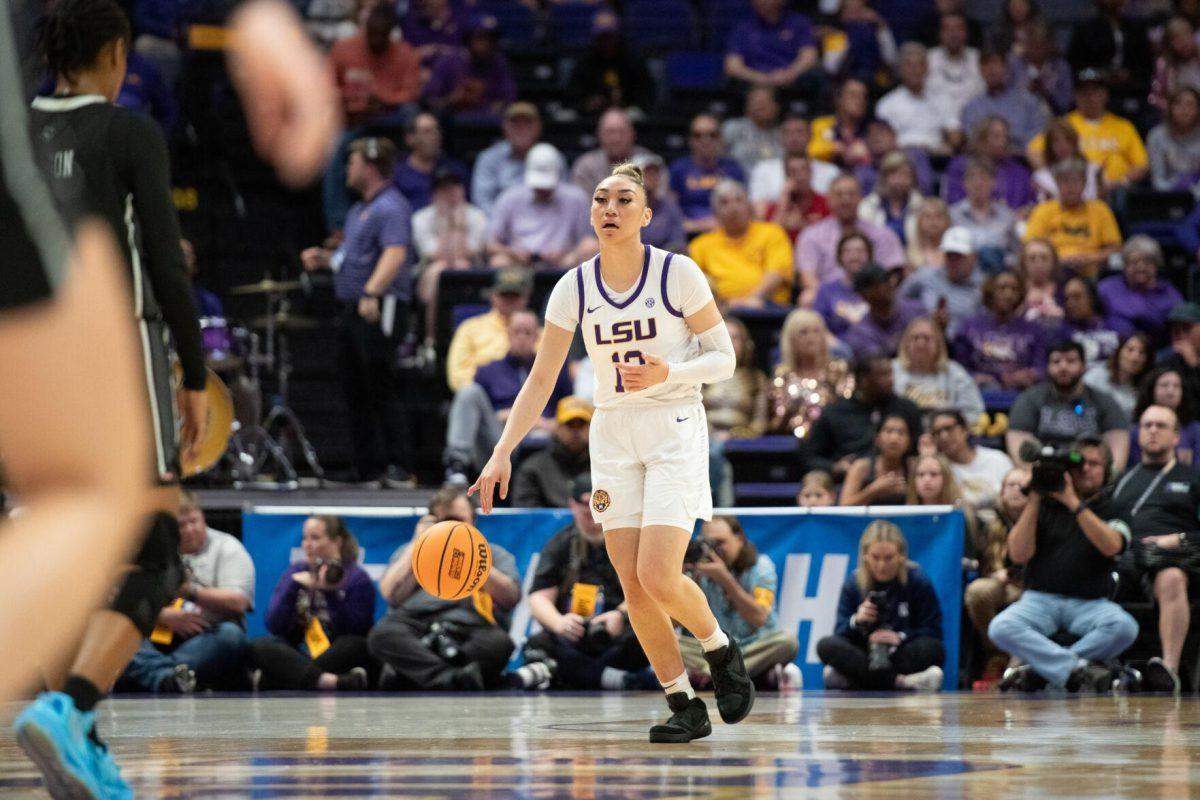 LSU women&#8217;s basketball junior guard Lear-Tear Poa (13) dribbles down the court Friday, March 22, 2024, during LSU&#8217;s 70-60 first-round NCAA March Madness tournament victory against Rice at the Pete Maravich Center in Baton Rouge, La.