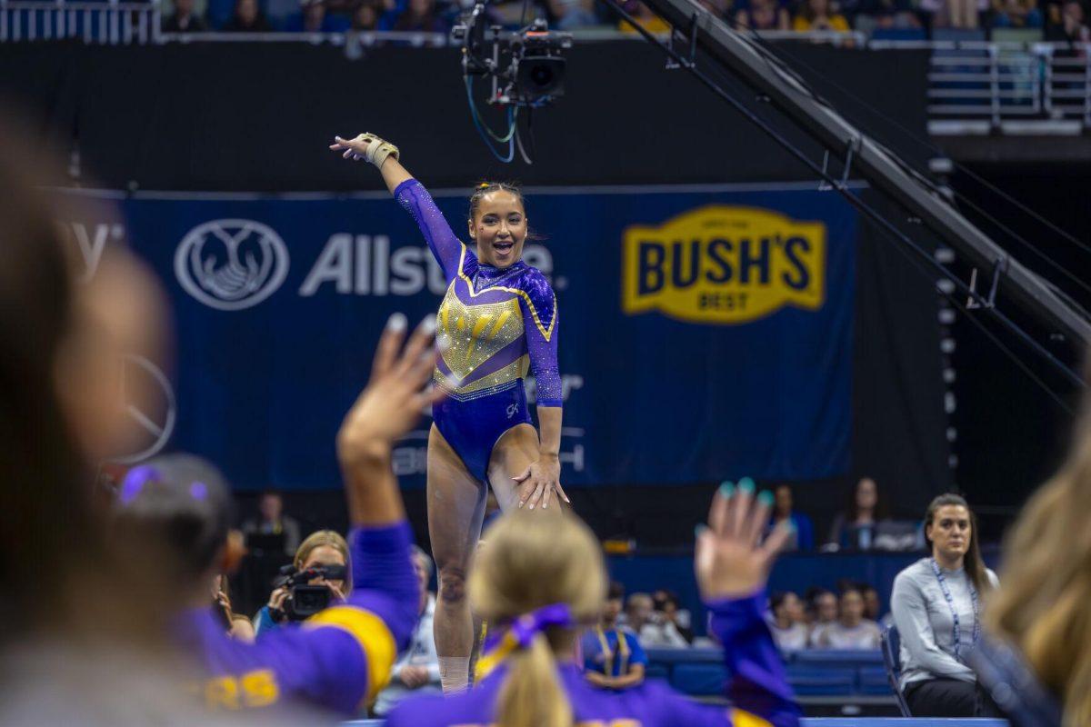 LSU gymnastics junior all-around Aleah Finnegan takes a stance Saturday, March 23, 2024, during LSU's 198.075 victory in the 2024 SEC Gymnastics Championship in the Smoothie King Center in New Orleans, La.