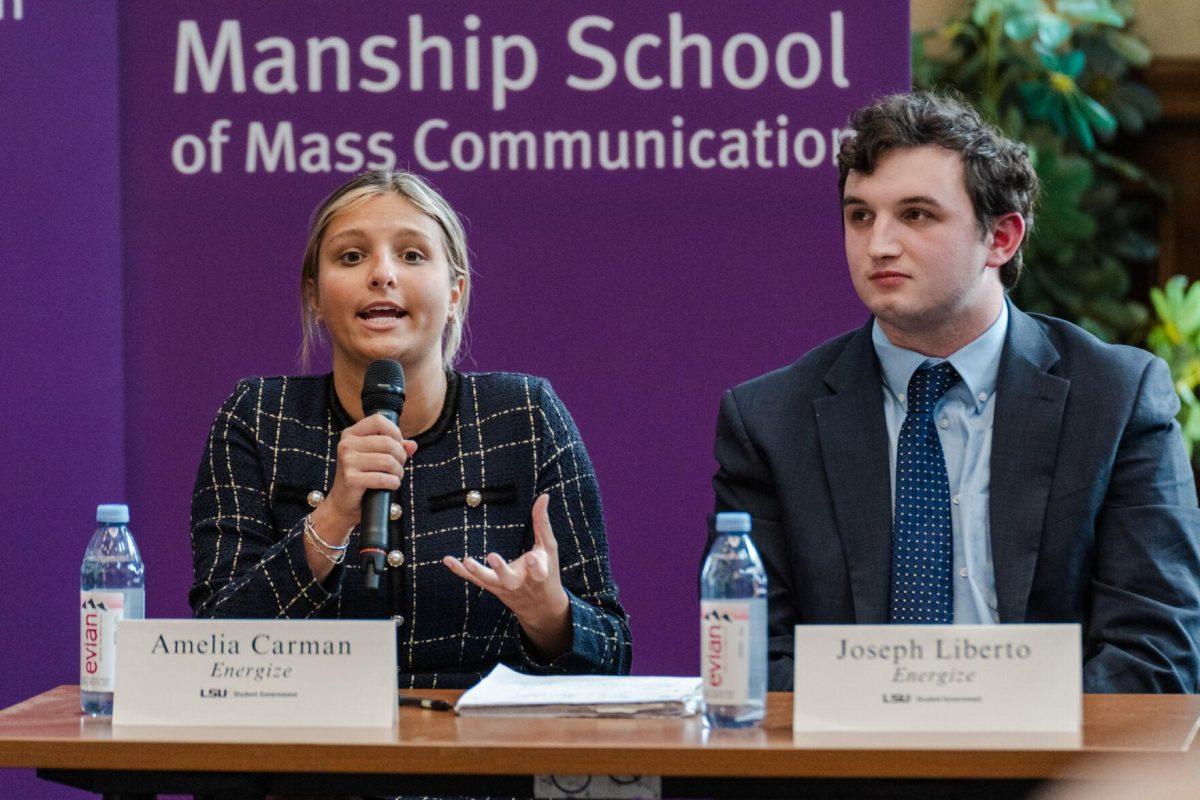 Amelia Carman answers a question as Joseph Liberto listens Monday, March 18, 2024, inside the Holliday Forum at LSU in Baton Rouge, La.