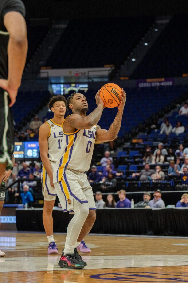 LSU men&#8217;s basketball 5th-year senior guard Trae Hannibal (0) shoots a free throw Tuesday, March 19, 2024, during LSU&#8217;s 84-77 loss to the University of North Texas at the PMAC in Baton Rouge, La.