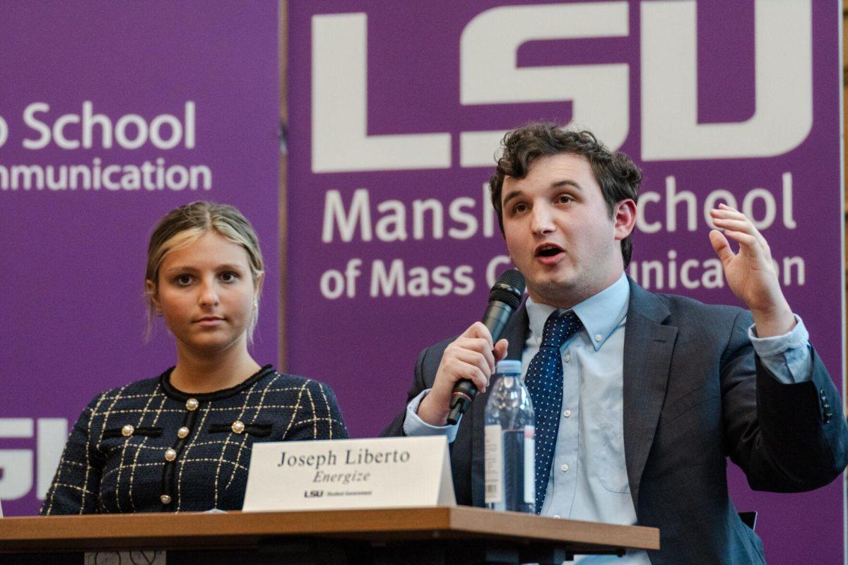 Joseph Liberto answers a question as Amelia Carman listens Monday, March 18, 2024, inside the Holliday Forum at LSU in Baton Rouge, La.