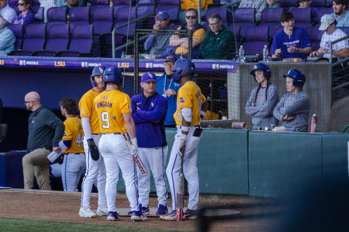 LSU baseball head coach Jay Johnson speaks with several players Sunday, March 10, 2024, during LSU's 2-1 loss to Xavier in Alex Box Stadium in Baton Rouge, La.