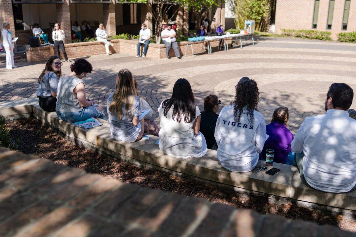 Attendees listen to speakers Tuesday, March 26, 2024, at the Believe March on LSU's campus.