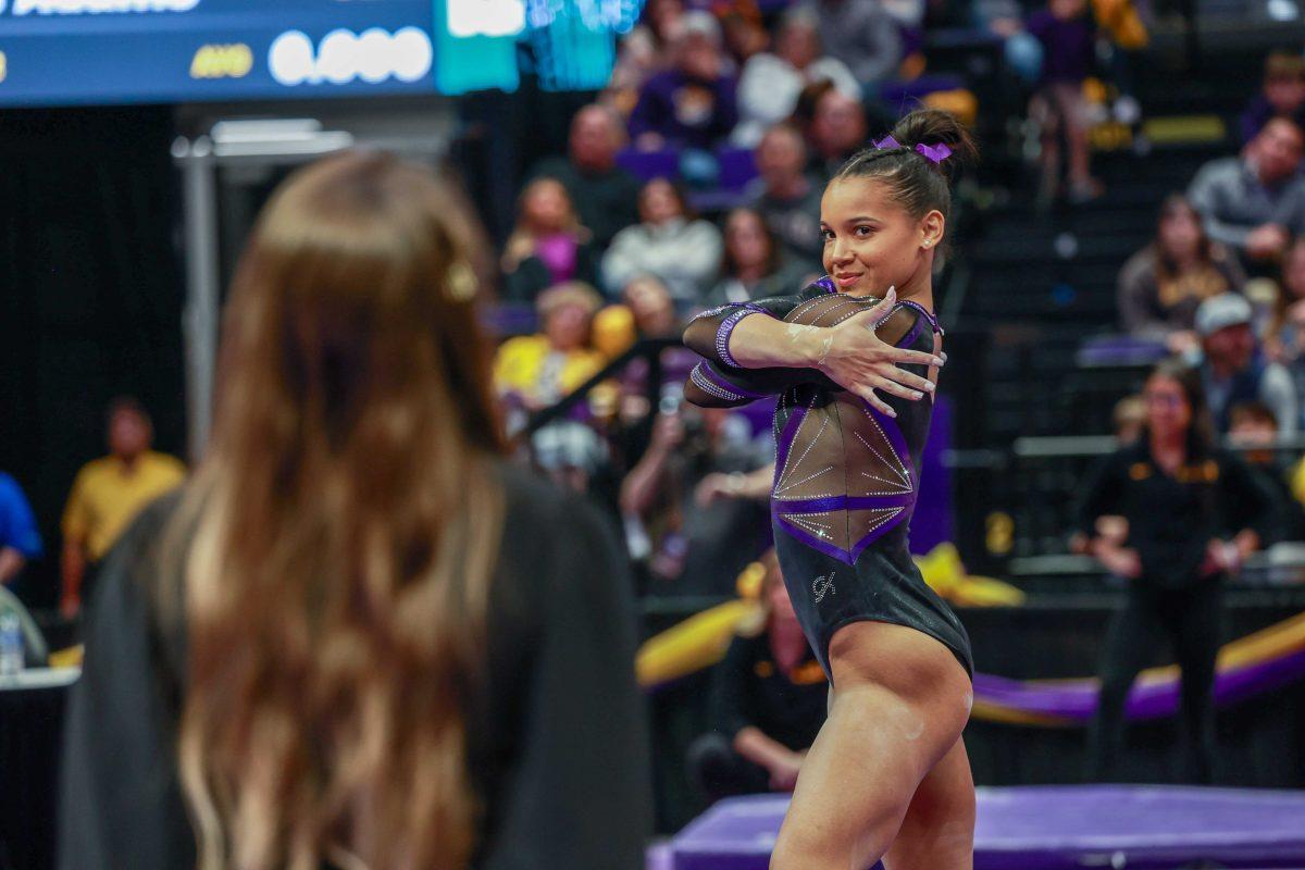 LSU gymnastics senior all-around Haleigh Bryant strikes a pose Friday, March 1, 2024, during LSU's 198.325-197.325 over Alabama in the Pete Maravich Assembly Center.&#160;