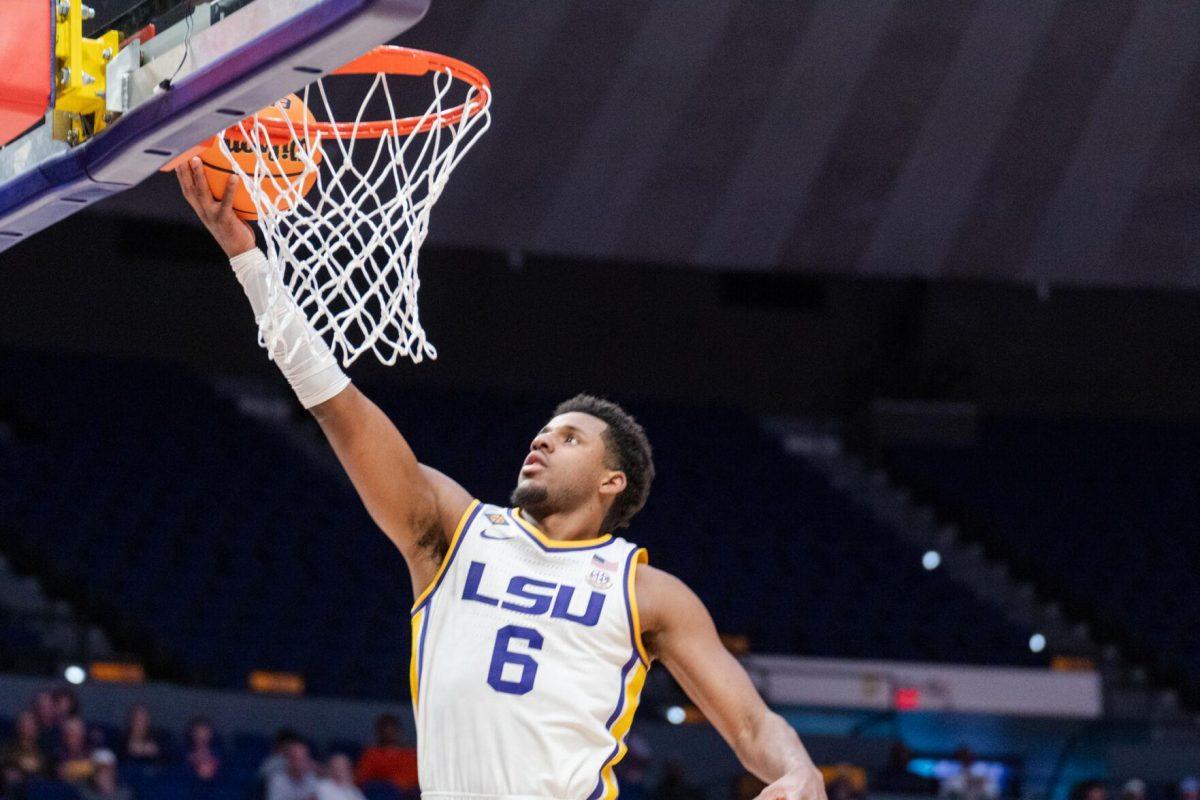 LSU men&#8217;s basketball graduate student guard Jordan Wright (6) scores a basket Tuesday, March 19, 2024, during LSU&#8217;s 84-77 loss to the University of North Texas at the PMAC in Baton Rouge, La.