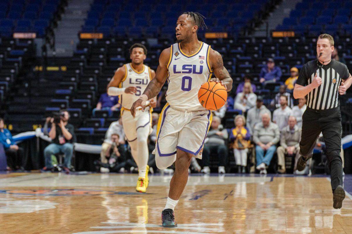 LSU men&#8217;s basketball 5th-year senior guard Trae Hannibal (0) dribbles down the court Tuesday, March 19, 2024, during LSU&#8217;s 84-77 loss to the University of North Texas at the PMAC in Baton Rouge, La.