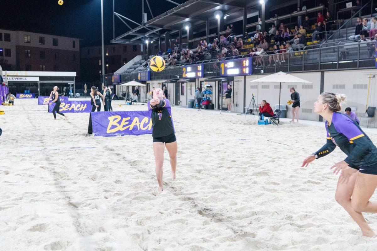 LSU beach volleyball redshirt freshman Kate Baker (8) hits the ball up Saturday, March 2, 2024, during LSU&#8217;s 5-0 win against Nebraska at the LSU Beach Volleyball Stadium in Baton Rouge, La.