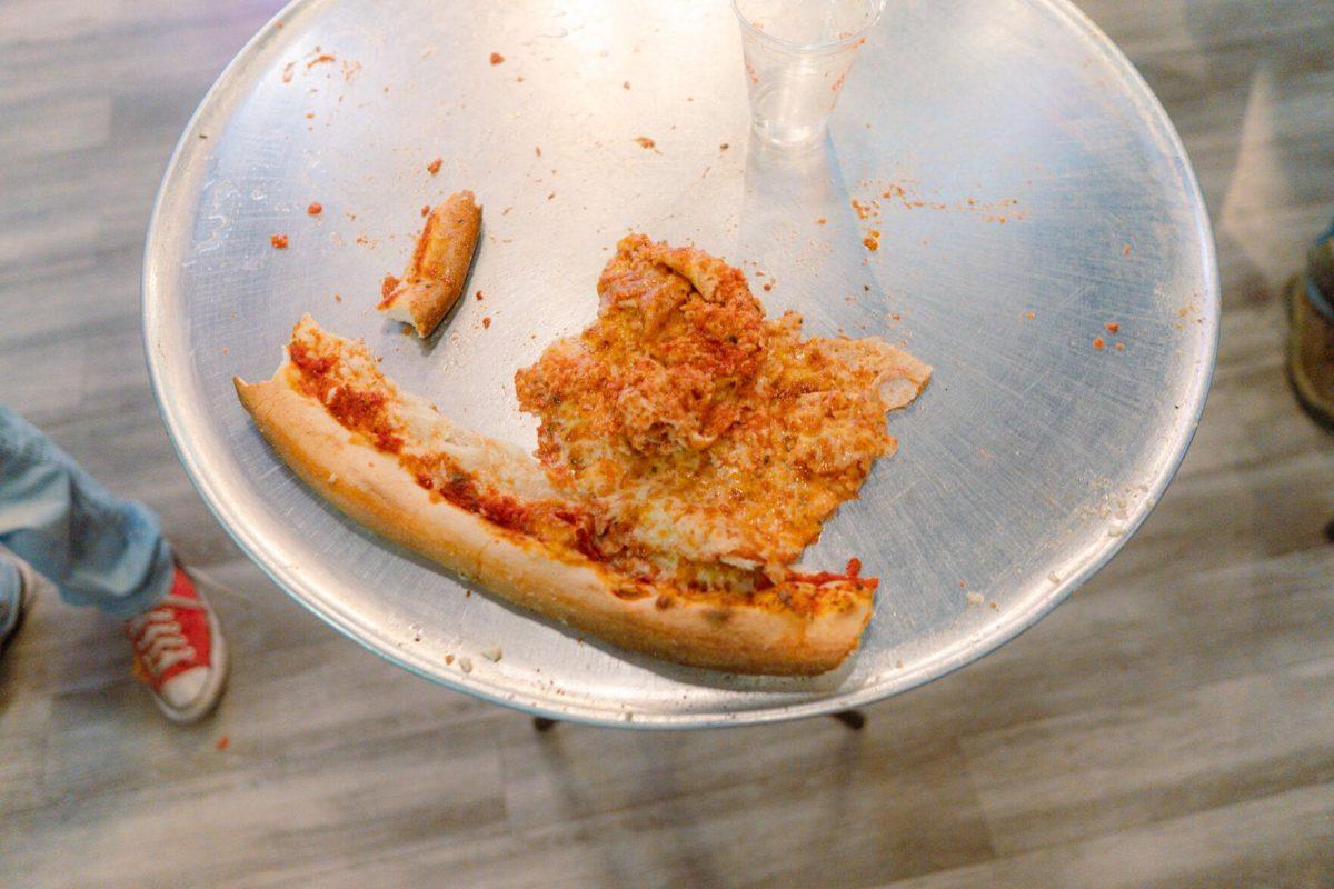 The remainders of the pizza sit on the tray Sunday, Feb. 18, 2024, at Fat Boy's Pizza on Nicholson Drive in Baton Rouge, La.