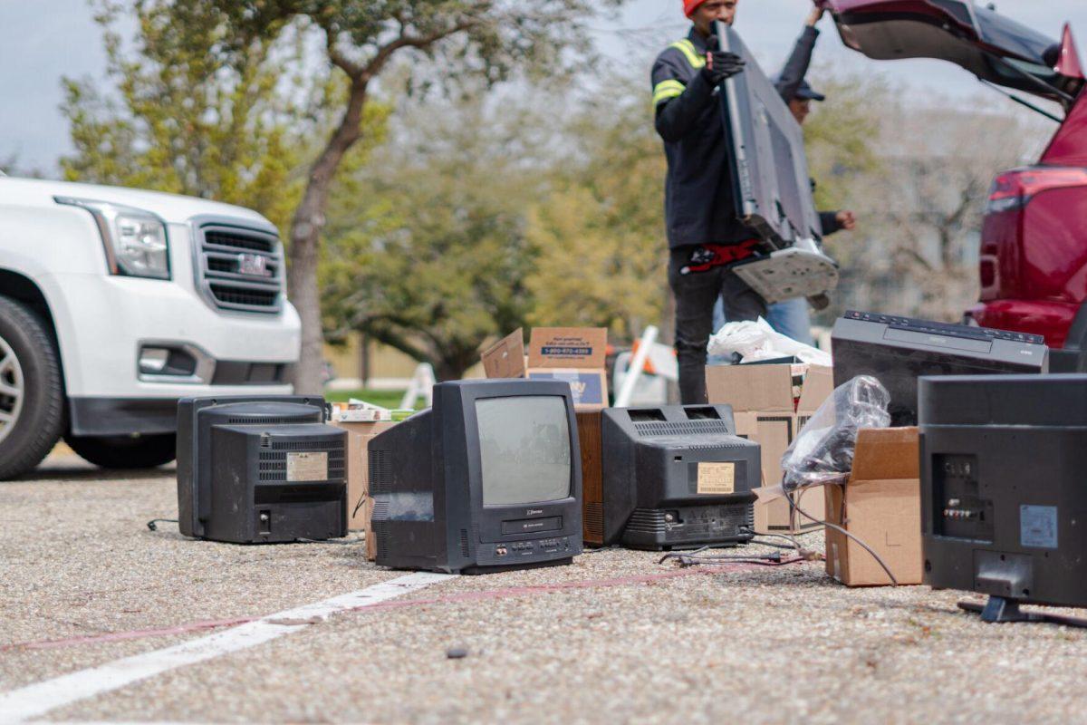 Old televisions sit together Saturday, March 2, 2024, at the Household Hazardous Materials Collection Day on LSU's campus in Baton Rouge, La.