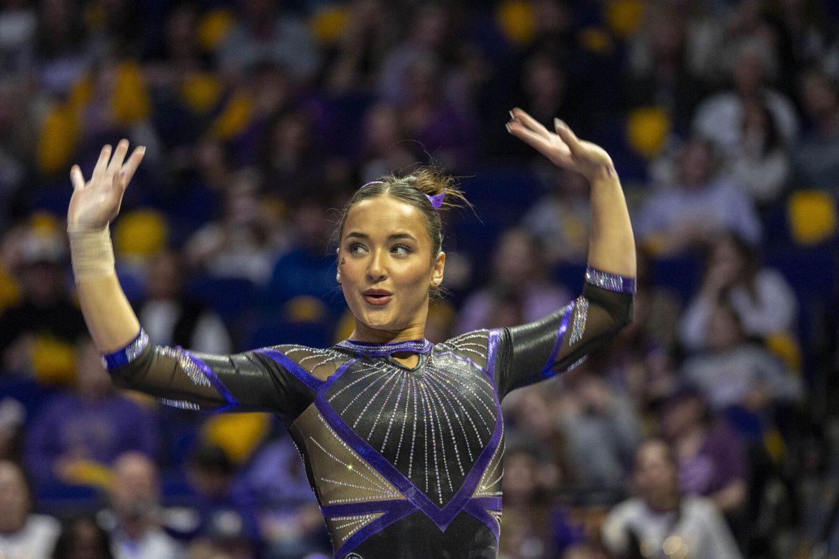 LSU gymnastics junior all-around Aleah Finnegan strikes a pose Friday, March 1, 2024, during LSU's 198.325-197.325 win over Alabama in the Pete Maravich Assembly Center.