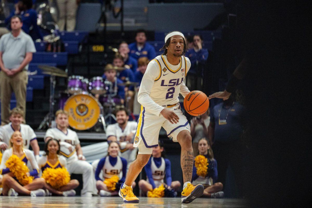 LSU men&#8217;s basketball freshman guard Mike Williams III (2) dribbles the ball Tuesday, March 19, 2024, during LSU&#8217;s 84-77 loss to the University of North Texas at the PMAC in Baton Rouge, La.