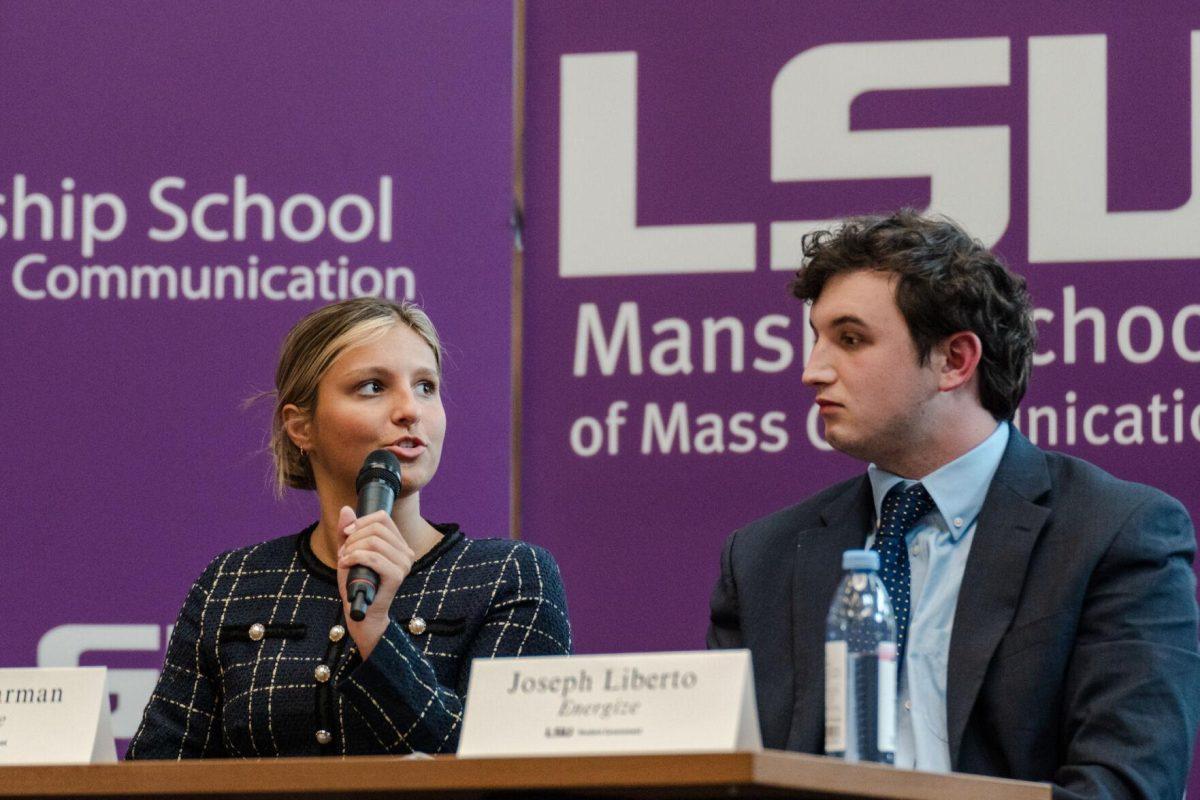 Amelia Carman answers a question as Joseph Liberto listens Monday, March 18, 2024, inside the Holliday Forum at LSU in Baton Rouge, La.