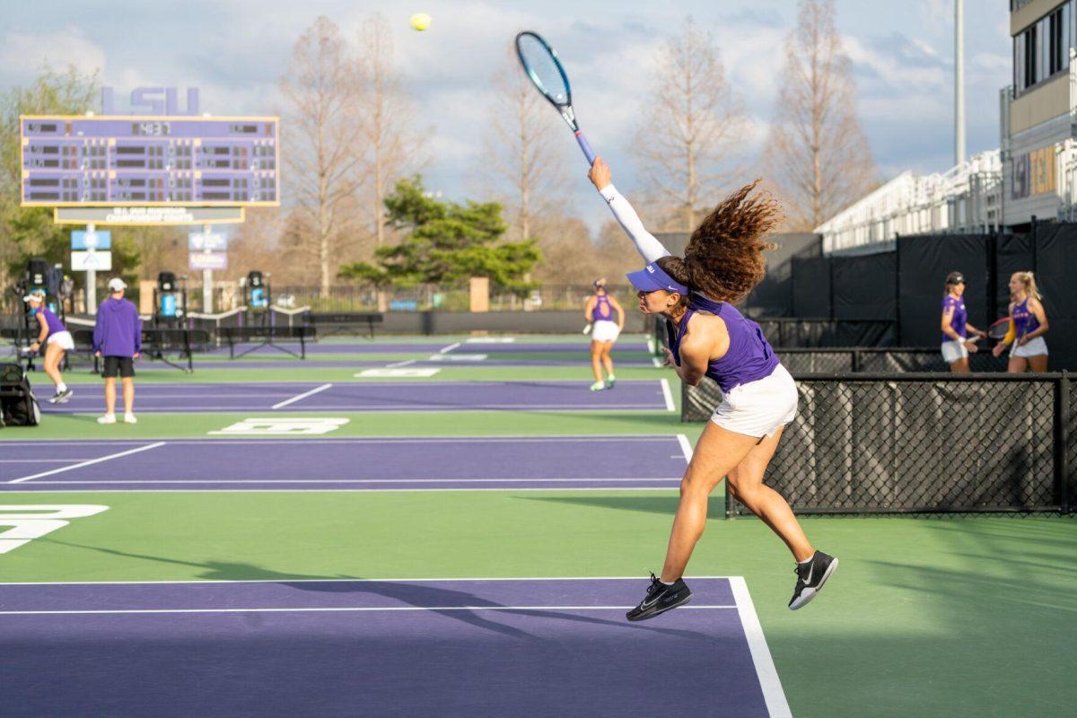 LSU women's tennis graduate student Maya Tahan hits a serve during her 6-4 doubles win against ULM Sunday, March 3, 2024, at the LSU Tennis Complex on Gourrier Avenue in Baton Rouge, La.