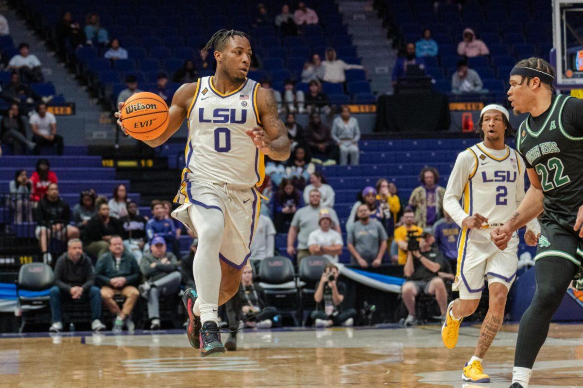 LSU men&#8217;s basketball 5th-year senior guard Trae Hannibal (0) leaps Tuesday, March 19, 2024, during LSU&#8217;s 84-77 loss to the University of North Texas at the PMAC in Baton Rouge, La.