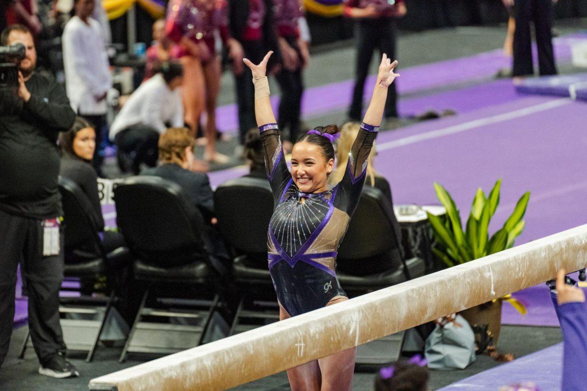 LSU gymnastics all-around junior Aleah Finnegan sticks the landing Friday, March 1, 2024, during LSU&#8217;s 198.325-197.325 win against Alabama in the Pete Maravich Assembly Center in Baton Rouge, La.