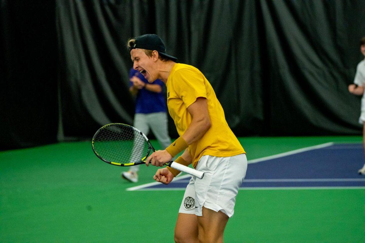 LSU men's tennis junior Julien Penzlin celebrates during his unfinished 7-6, 5-5 doubles match against Ole Miss Friday, March 8, 2024, at the LSU tennis complex on Gourrier Avenue in Baton Rouge, La.