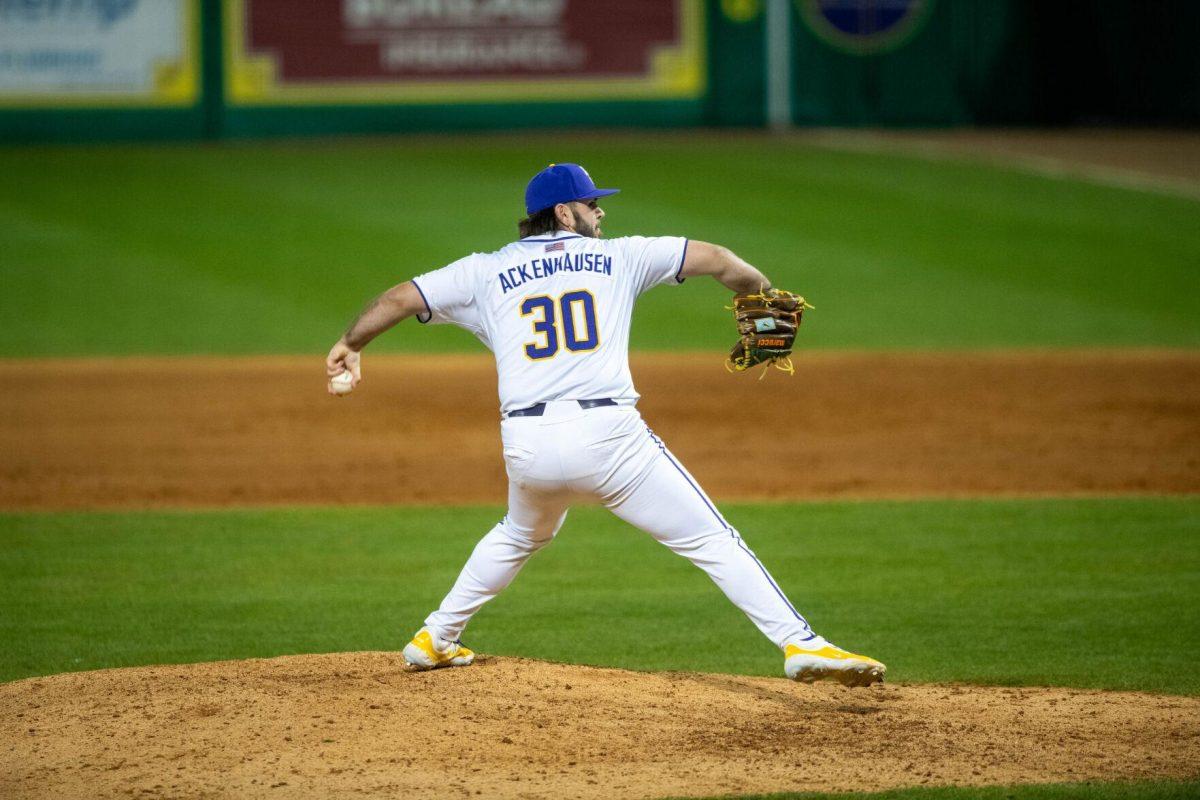 LSU baseball senior pitcher Nate Ackenhausen (30) begins his pitch during LSU's 6-4 loss against Florida on Saturday, March 23, 2024, at Alex Box Stadium in Baton Rouge, La.